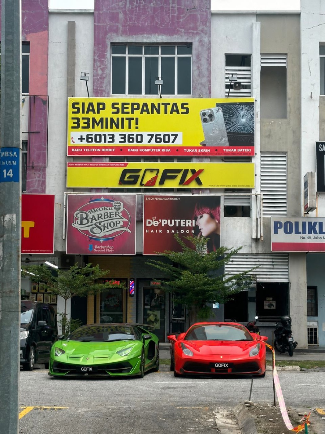 Kedai GOFIX Subang Bestari di Jalan Nova U5/N, Shah Alam — papan iklan kuning bertulis Siap Sepantas 33 Minit dengan nombor 013 360 7607